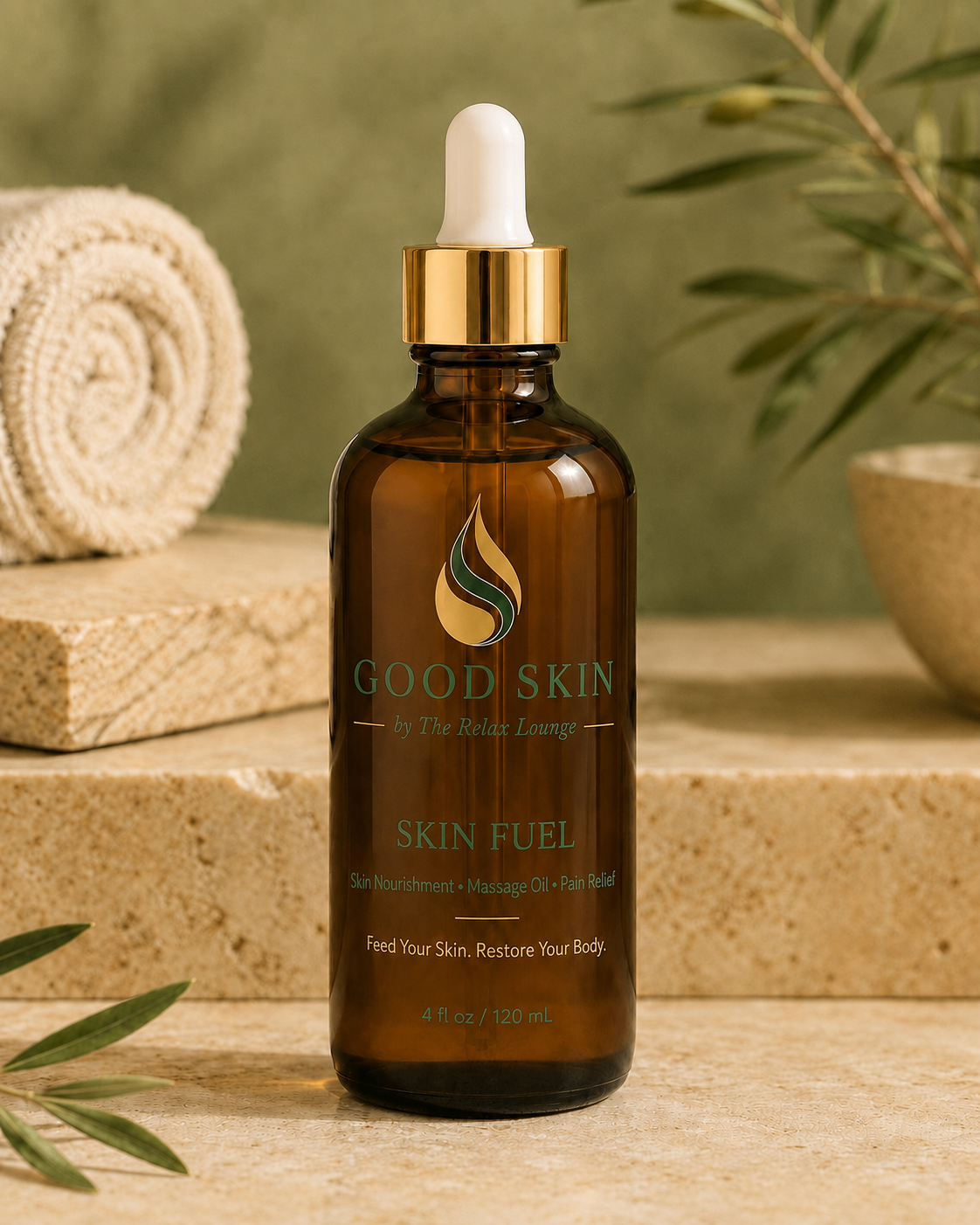 Good Skin Skin Fuel nourishing body and massage oil in a four ounce amber glass bottle with a gold collar and white dropper